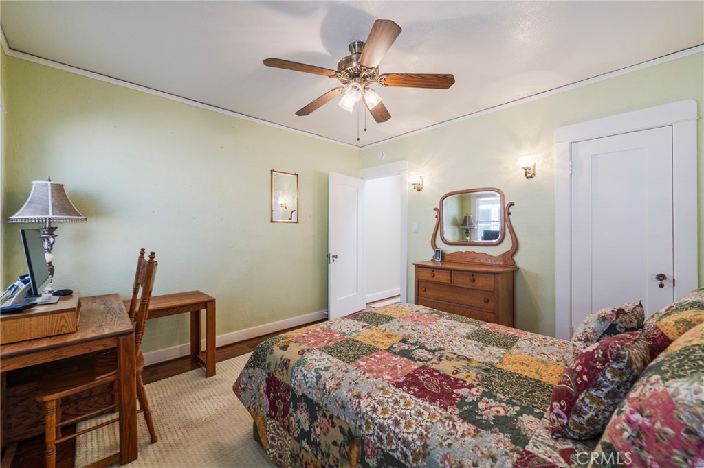 405 North Janss Street Anaheim, CA 92805 - Photo 21 of 33 a bedroom with a bed and a chandelier