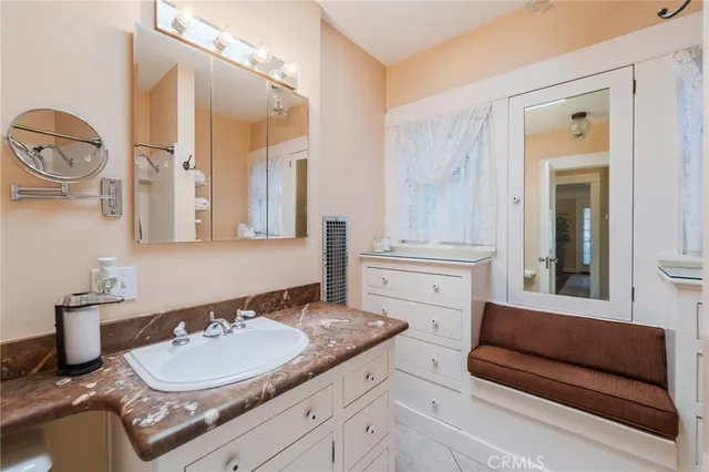 a bathroom with a bath tub and a shower