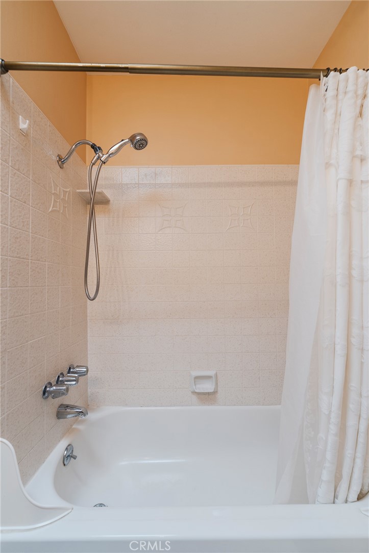 405 North Janss Street Anaheim, CA 92805 - Photo 23 of 33 a bathroom with a bath tub and a shower