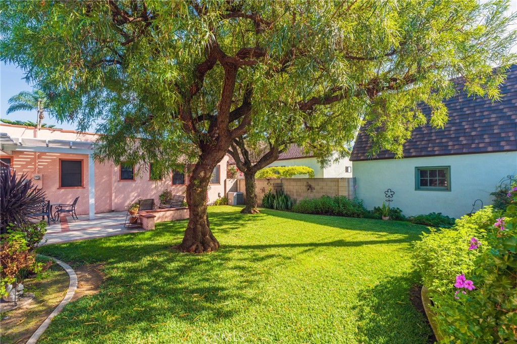 405 North Janss Street Anaheim, CA 92805 - Photo 31 of 33 a view of a house with a yard and tree s