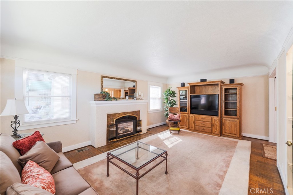 405 North Janss Street Anaheim, CA 92805 - Photo 5 of 33 a living room with furniture and a fireplace