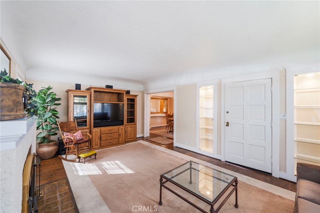 405 North Janss Street Anaheim, CA 92805 - Photo 6 of 33 a living room with furniture a dining table and chair with potted plants