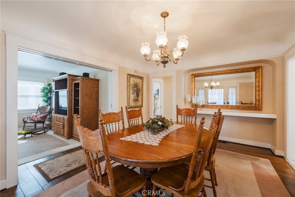 405 North Janss Street Anaheim, CA 92805 - Photo 7 of 33 a view of a dining room with furniture window and wooden floor