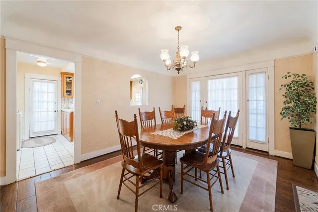 a view of a dining room with furniture and window