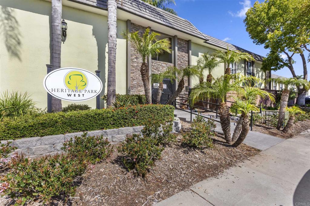 6602 Beadnell Way, Unit 26 San Diego, CA 92117 - Photo 2 of 25 a building with trees in front of it