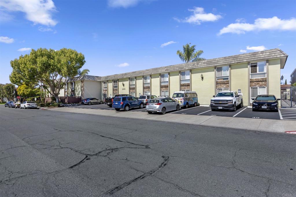 6602 Beadnell Way, Unit 26 San Diego, CA 92117 - Photo 4 of 25 a cars parked in front of a building