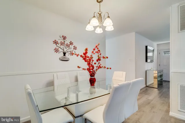 a view of a hallway with washer and dryer