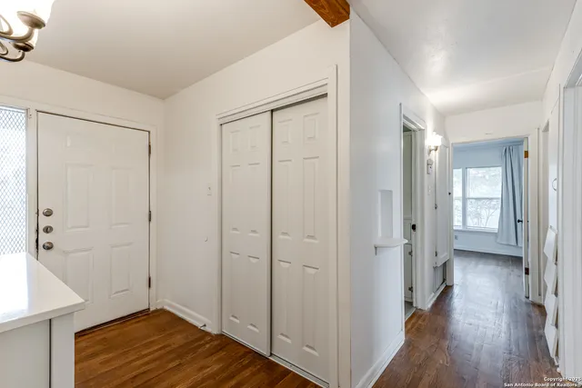 a view of a bathroom with closet area