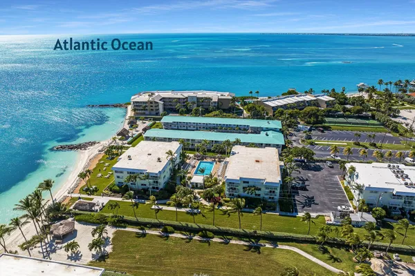 an aerial view of houses with outdoor space