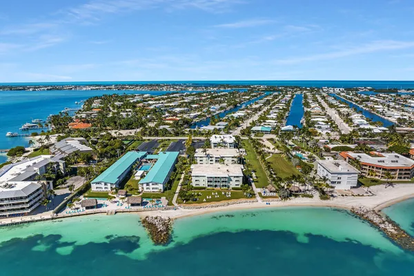 an aerial view of a city with lawn chairs