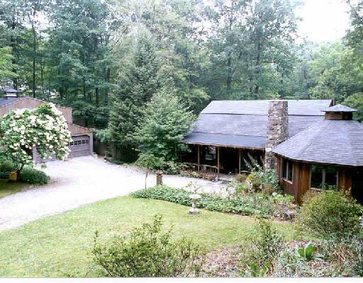 293 Florida Hill Road Ridgefield, CT 06877 - Photo 1 of 1 a view of a house with a yard and a garden