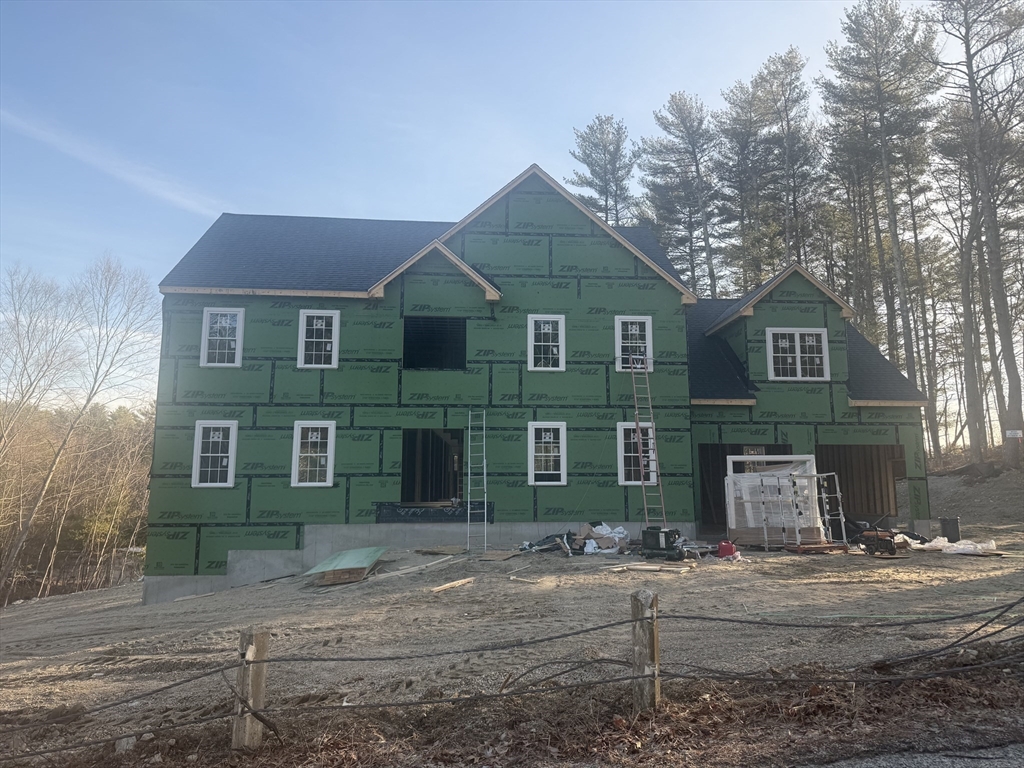 Lot 4 Moon Hill Road Northbridge, MA 01534 - Photo 1 of 2 a front view of a house with a yard and garage