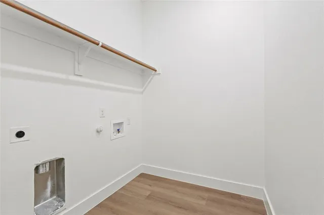 a view of small space with wooden floor