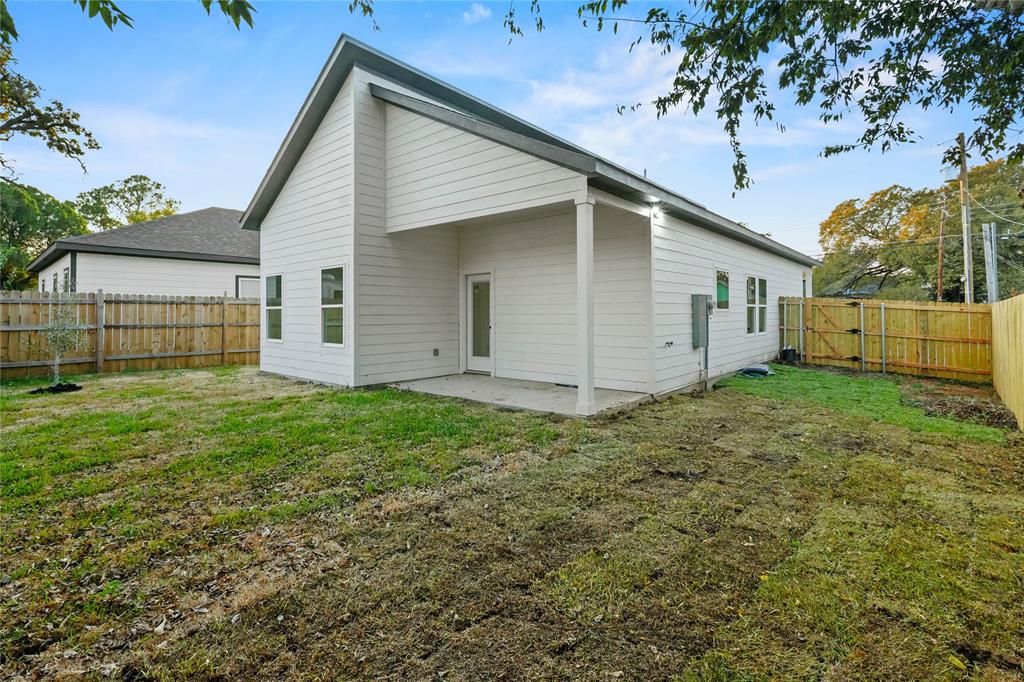 3910 Hancock Street Dallas, TX 75210 - Photo 17 of 20 a view of a house with a yard