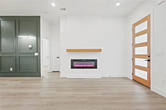 a view of an empty room and window