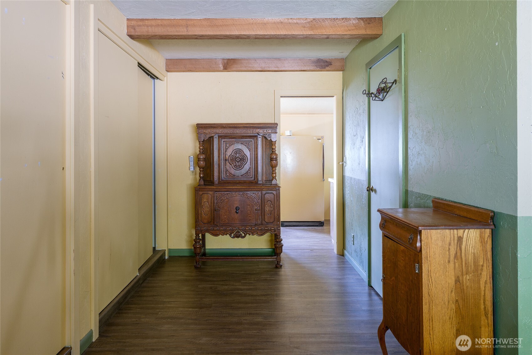 208 Tides End Road Lopez Island, WA 98261 - Photo 22 of 40 a view of a hallway with wooden floor and closet
