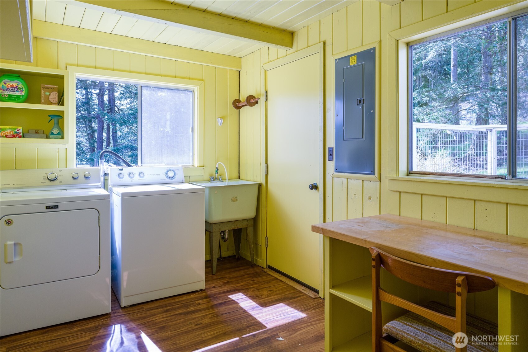 208 Tides End Road Lopez Island, WA 98261 - Photo 24 of 40 a room with a washing machine and sink