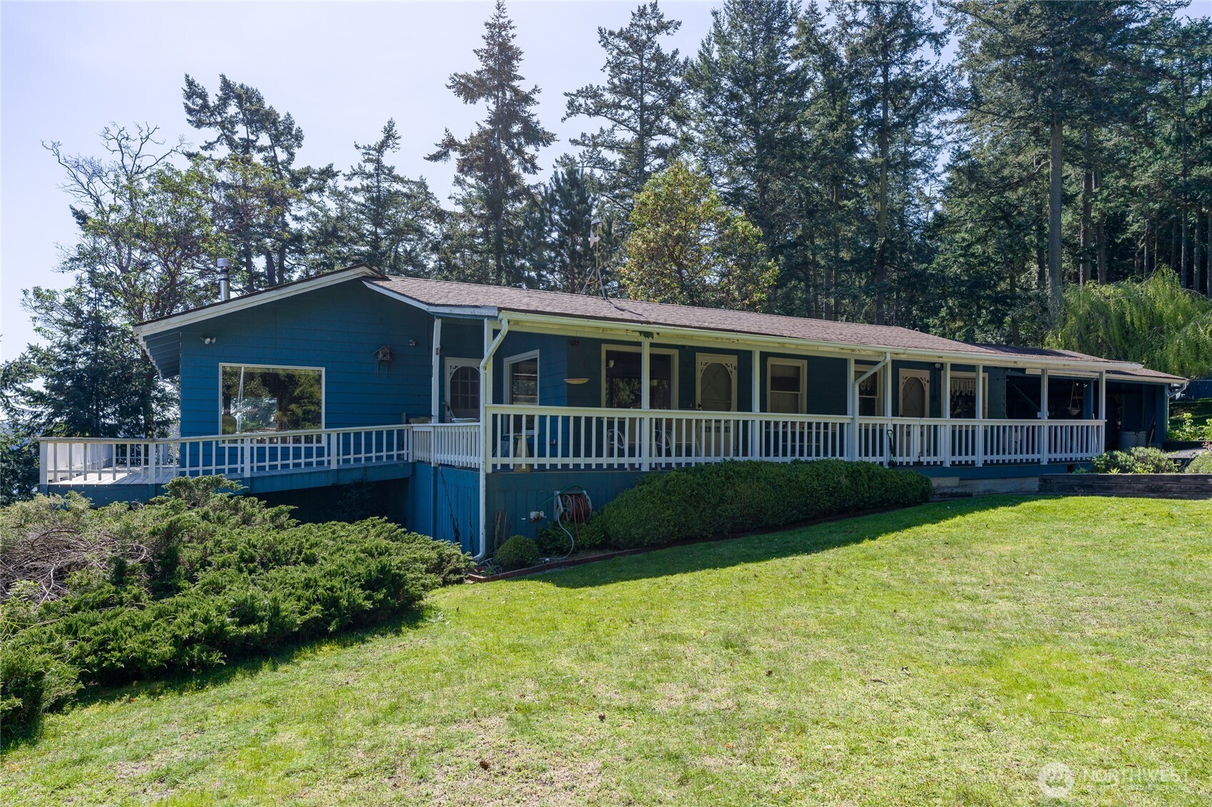 208 Tides End Road Lopez Island, WA 98261 - Photo 25 of 40 a view of house with backyard and swimming pool