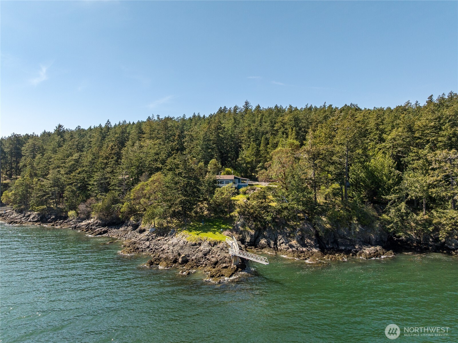 208 Tides End Road Lopez Island, WA 98261 - Photo 36 of 40 a view of a golf course with green space