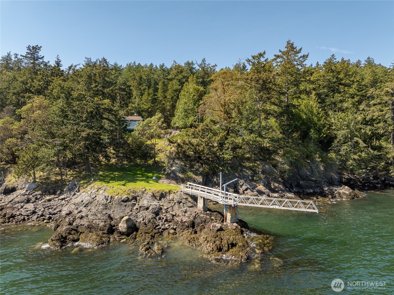 208 Tides End Road Lopez Island, WA 98261 - Photo 39 of 40 a view of a lake with houses