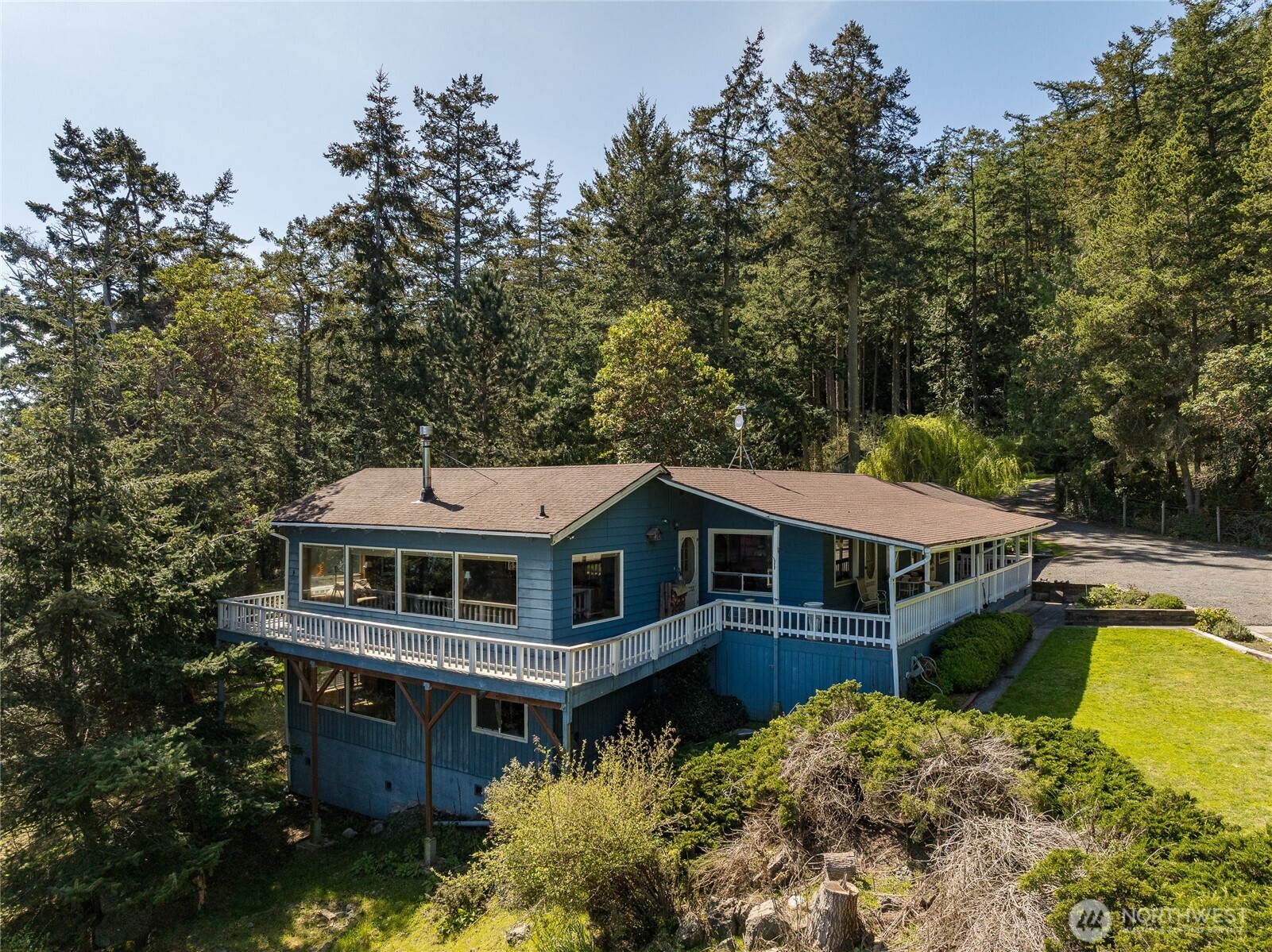 208 Tides End Road Lopez Island, WA 98261 - Photo 6 of 40 an aerial view of a house with swimming pool