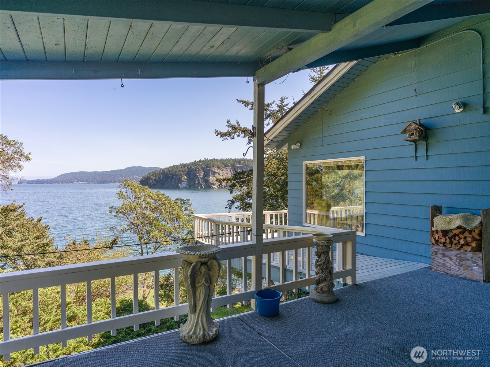 208 Tides End Road Lopez Island, WA 98261 - Photo 8 of 40 a view of a balcony with furniture