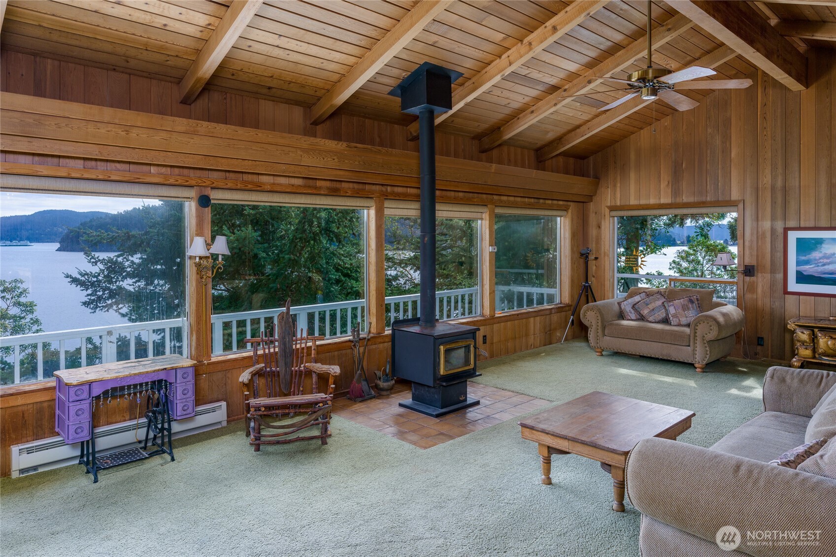 208 Tides End Road Lopez Island, WA 98261 - Photo 10 of 40 a building outdoor space with patio furniture