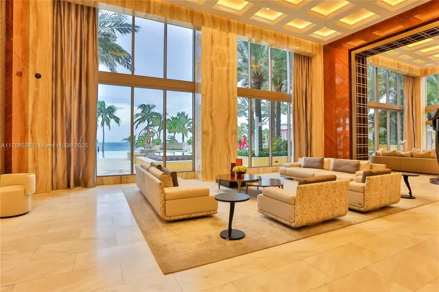 a view of a backyard with sitting area