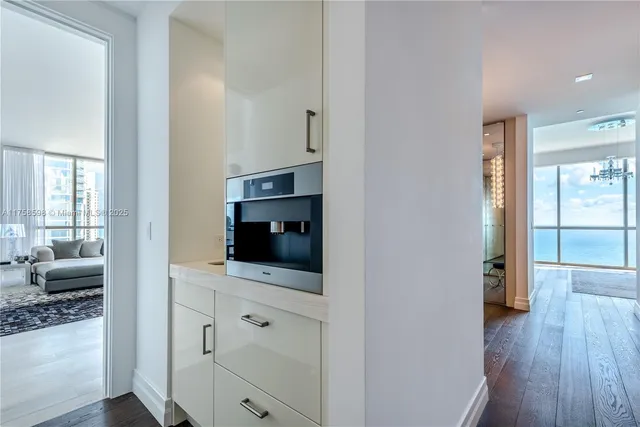 a bathroom with a shower toilet and sink