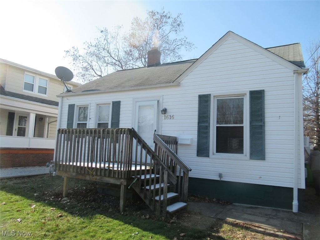 1616 Douglas Road Wickliffe, OH 44092 - Photo 1 of 1 Rear view of house featuring a deck