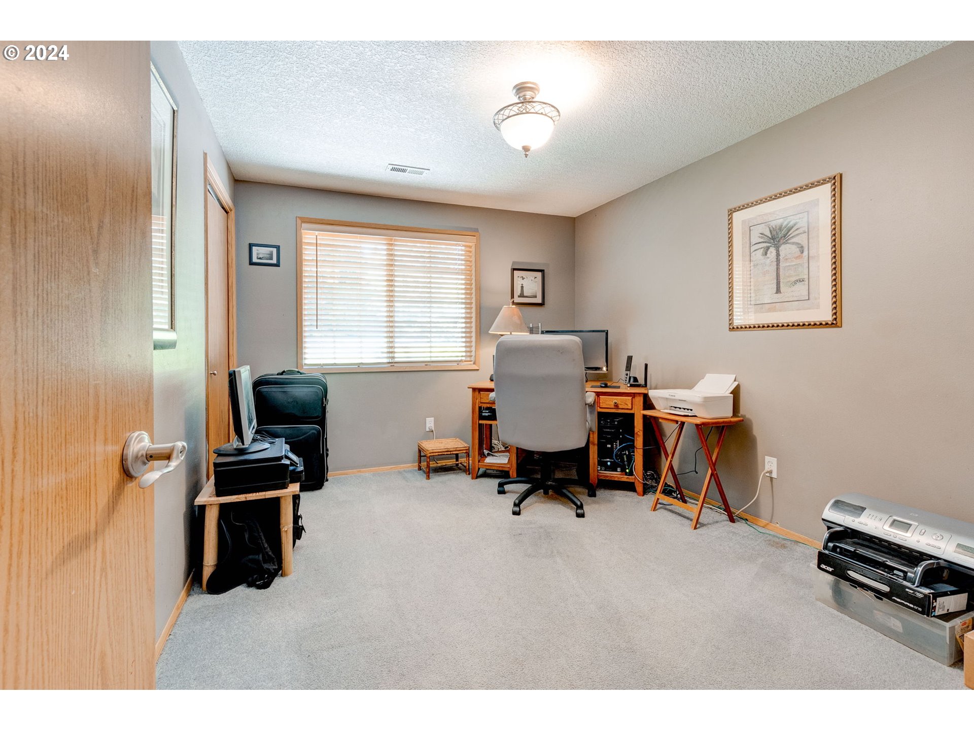 30121 Northeast Harrison Road Battle Ground, WA 98604 - Photo 22 of 40 a workspace with furniture and window