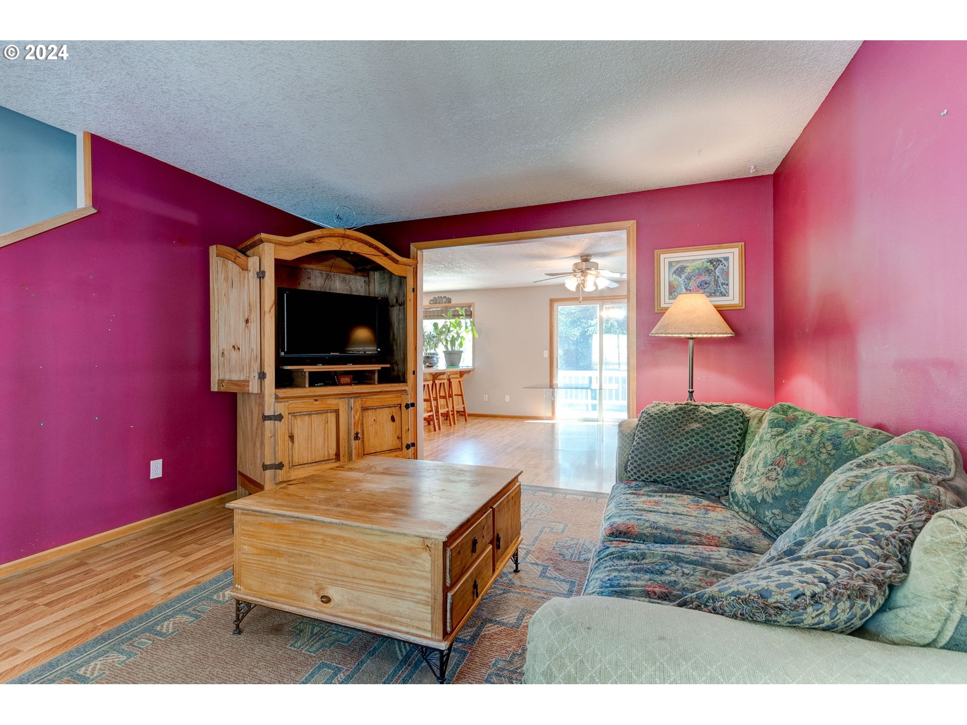 30121 Northeast Harrison Road Battle Ground, WA 98604 - Photo 25 of 40 a living room with furniture and a flat screen tv