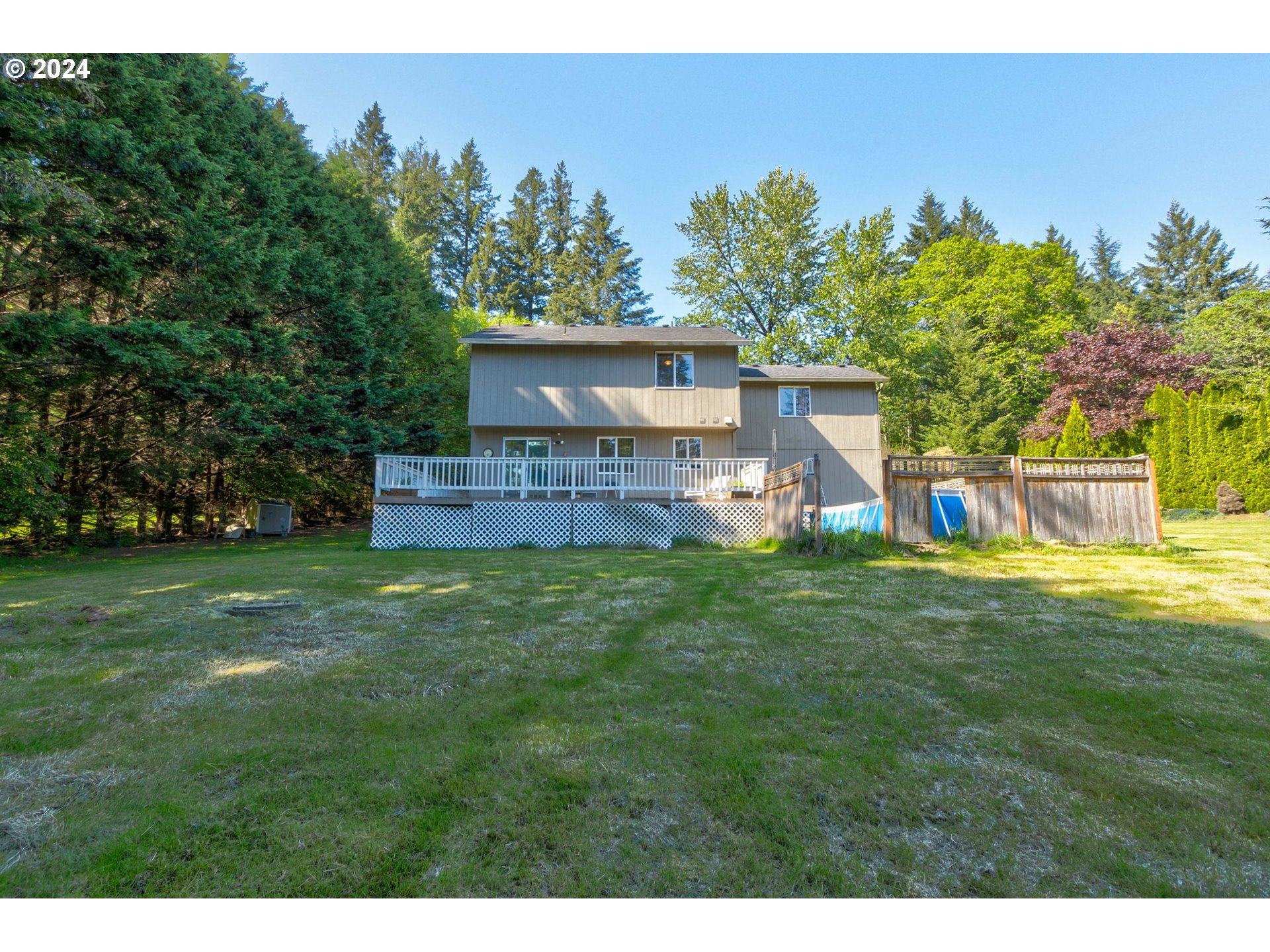 30121 Northeast Harrison Road Battle Ground, WA 98604 - Photo 27 of 40 a view of a backyard with a garden and entertaining space