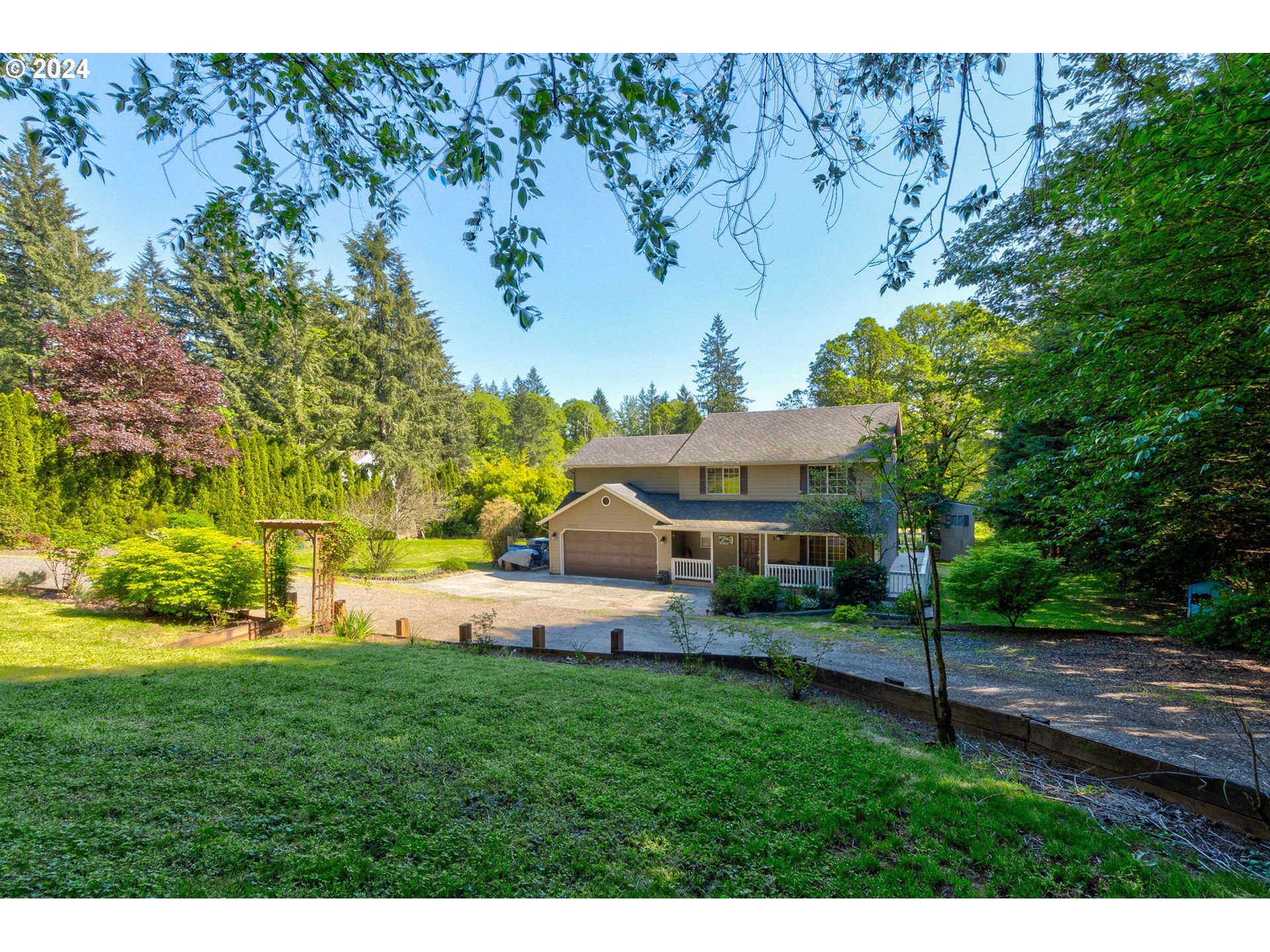 30121 Northeast Harrison Road Battle Ground, WA 98604 - Photo 3 of 40 a view of a house with a yard