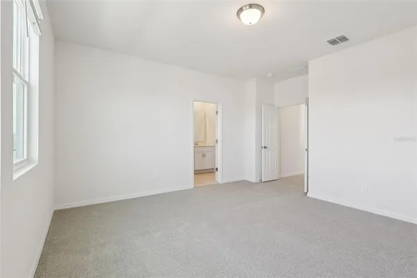 a bathroom with 2 sink and a mirror