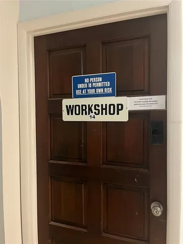 a large room with lots of table and chairs