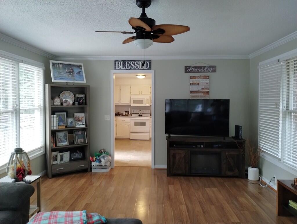 227 Vista View Lane Ridgeway, VA 24148 - Photo 15 of 45 a living room with furniture and a flat screen tv