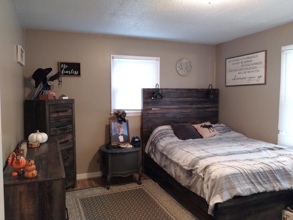 227 Vista View Lane Ridgeway, VA 24148 - Photo 20 of 45 a bed sitting in a bedroom next to a window