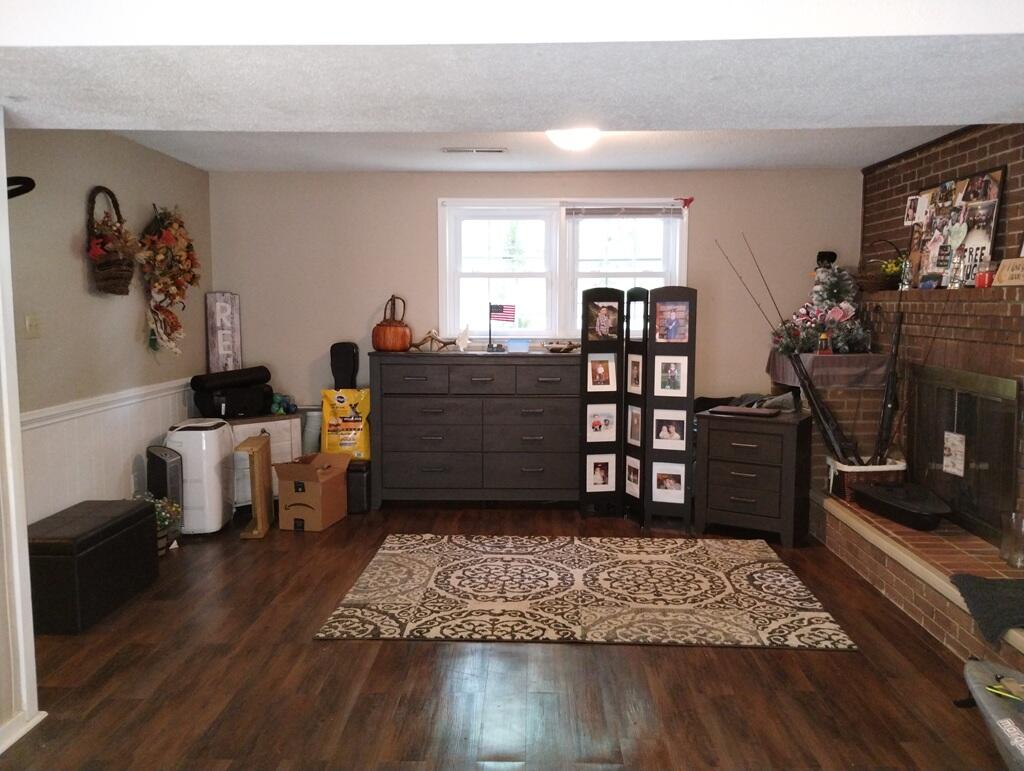 227 Vista View Lane Ridgeway, VA 24148 - Photo 25 of 45 a living room with furniture and a wooden floor