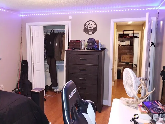 a kitchen with a refrigerator and a sink