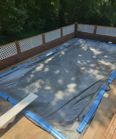 a room with furniture a rug and a window