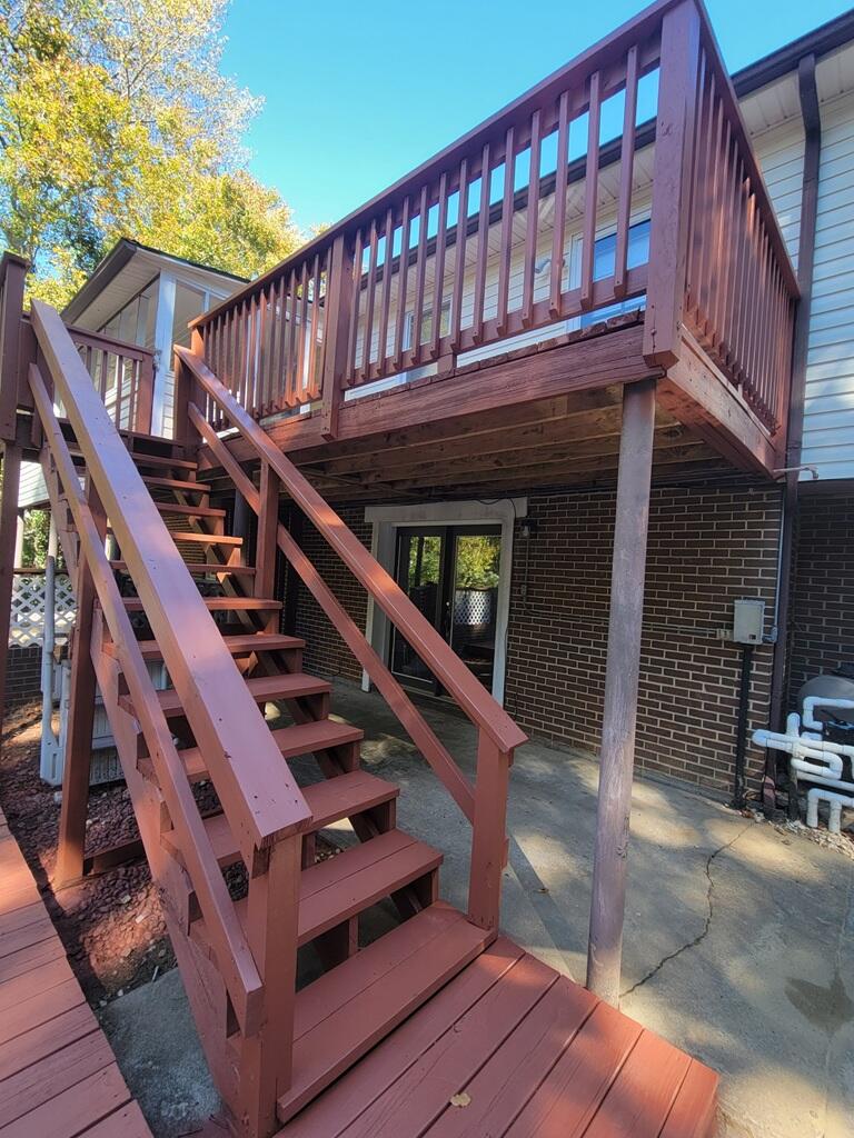 227 Vista View Lane Ridgeway, VA 24148 - Photo 42 of 45 a view of wooden house with large windows and stairs