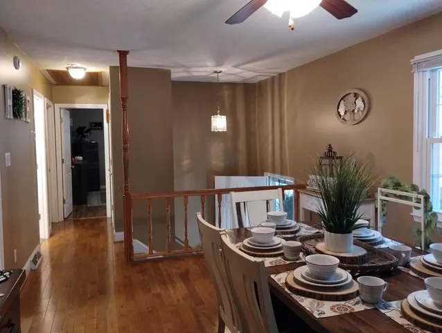 a table with chairs and stove