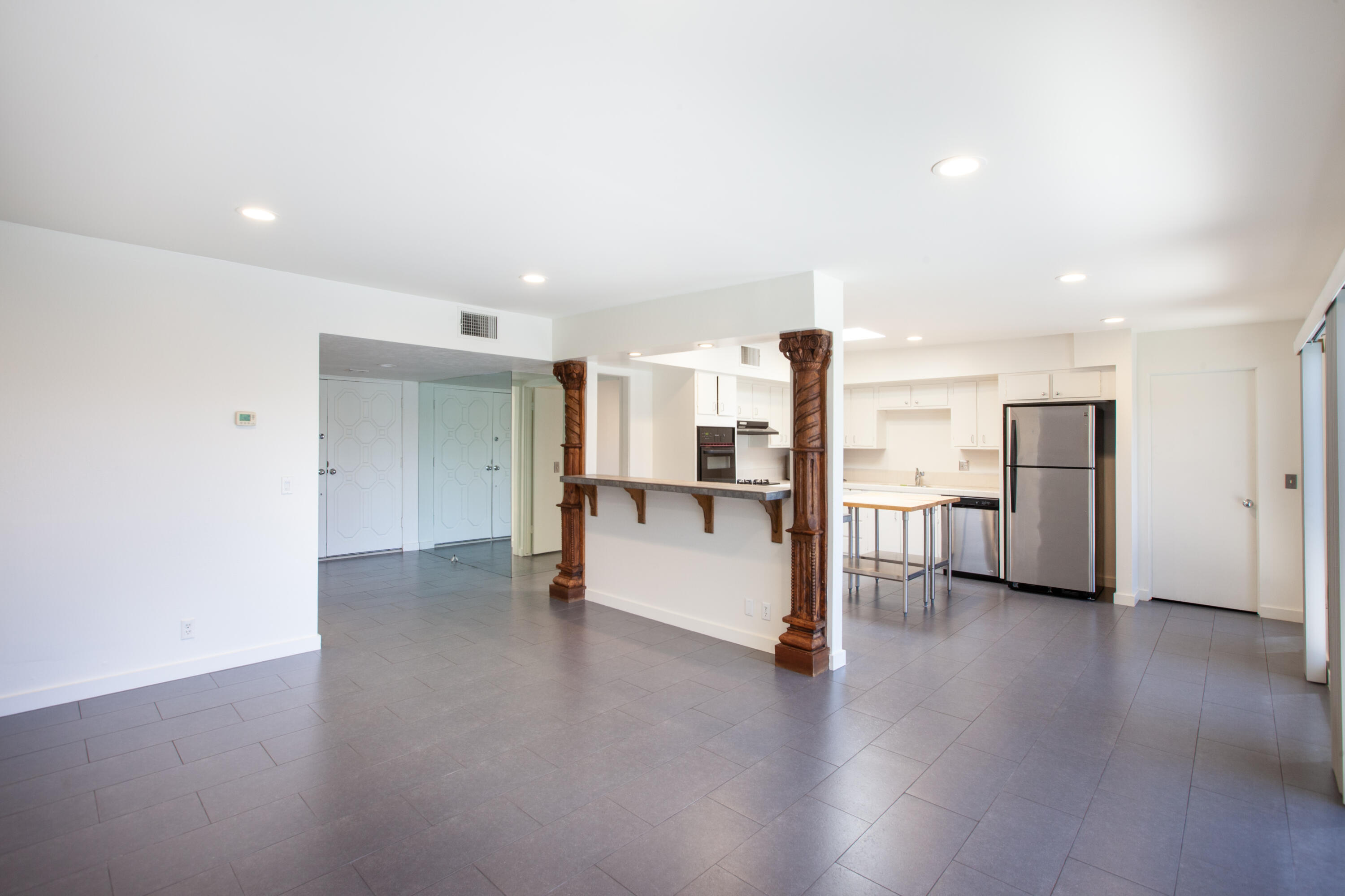 3033 East Verona Road Palm Springs, CA 92262 - Photo 6 of 23 a view of a kitchen with refrigerator and a sink