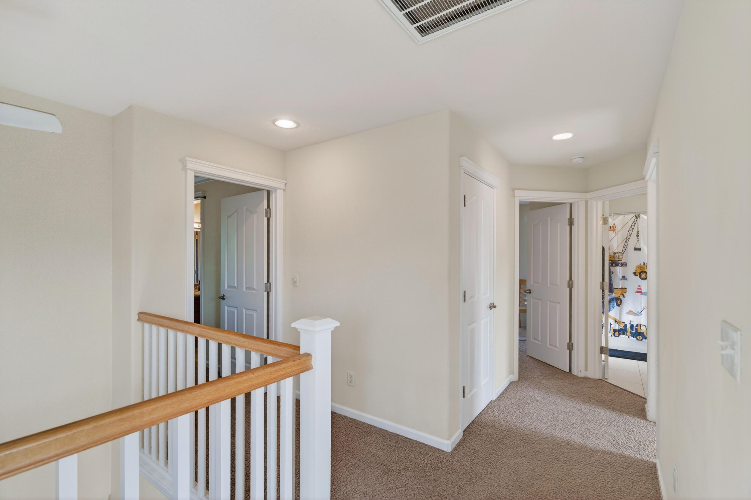 2090 Tuscany Way Redding, CA 96003 - Photo 18 of 37 a view of a hallway with wooden floor and entryway