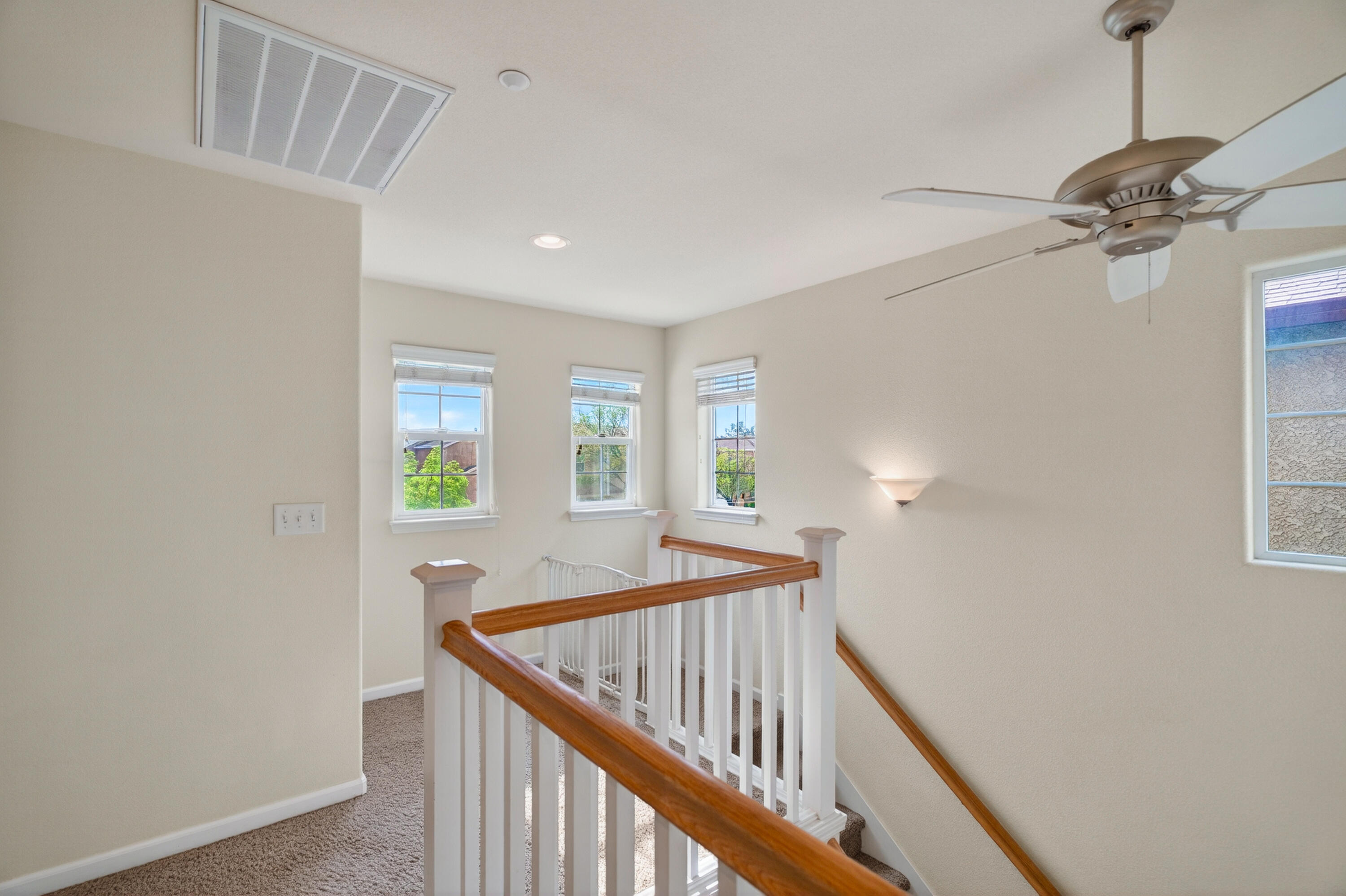 2090 Tuscany Way Redding, CA 96003 - Photo 19 of 37 a view of a hallway with a window