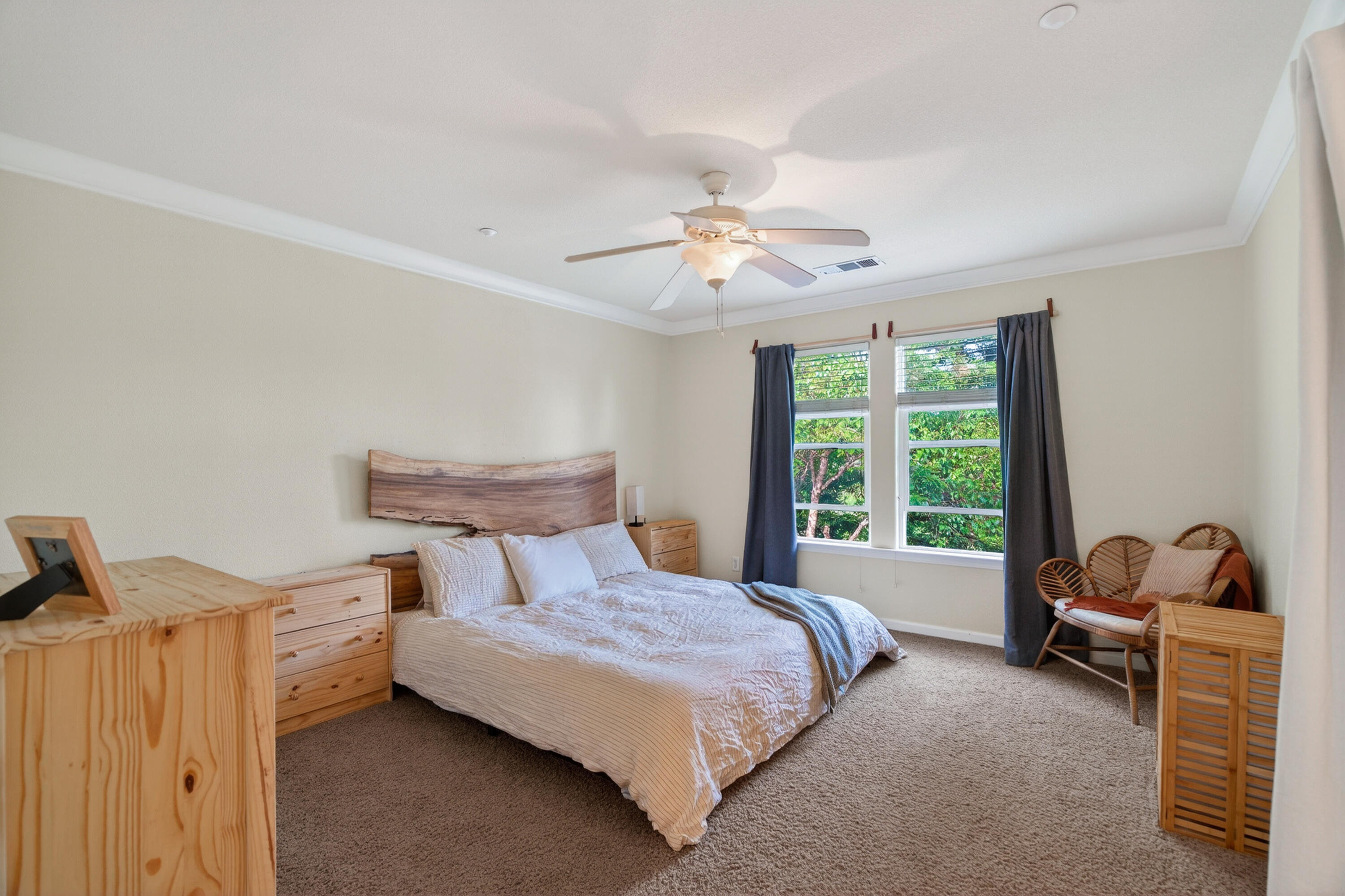 2090 Tuscany Way Redding, CA 96003 - Photo 20 of 37 a bedroom with a bed and a window