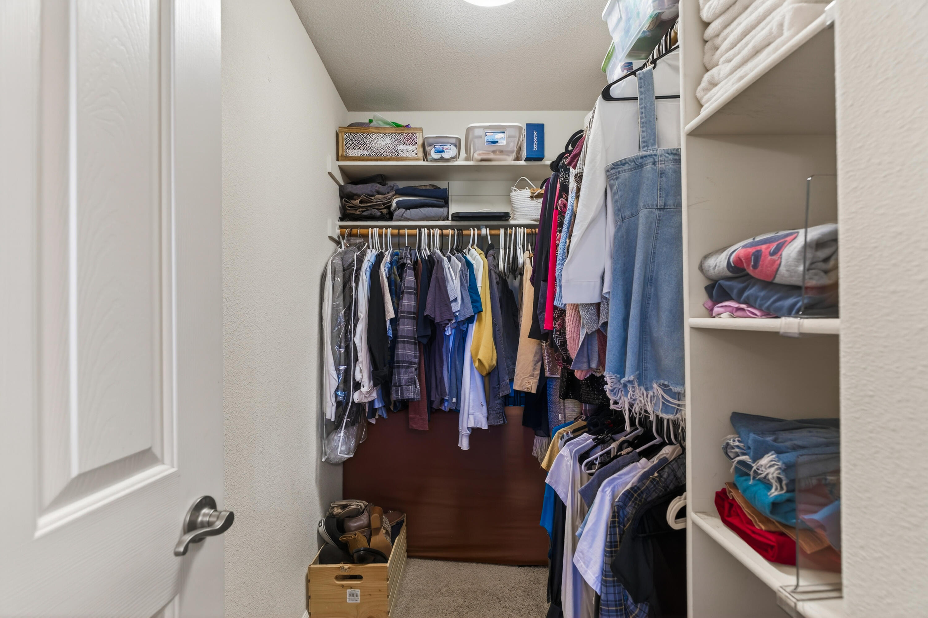 2090 Tuscany Way Redding, CA 96003 - Photo 26 of 37 a view of walk in closet with clothes