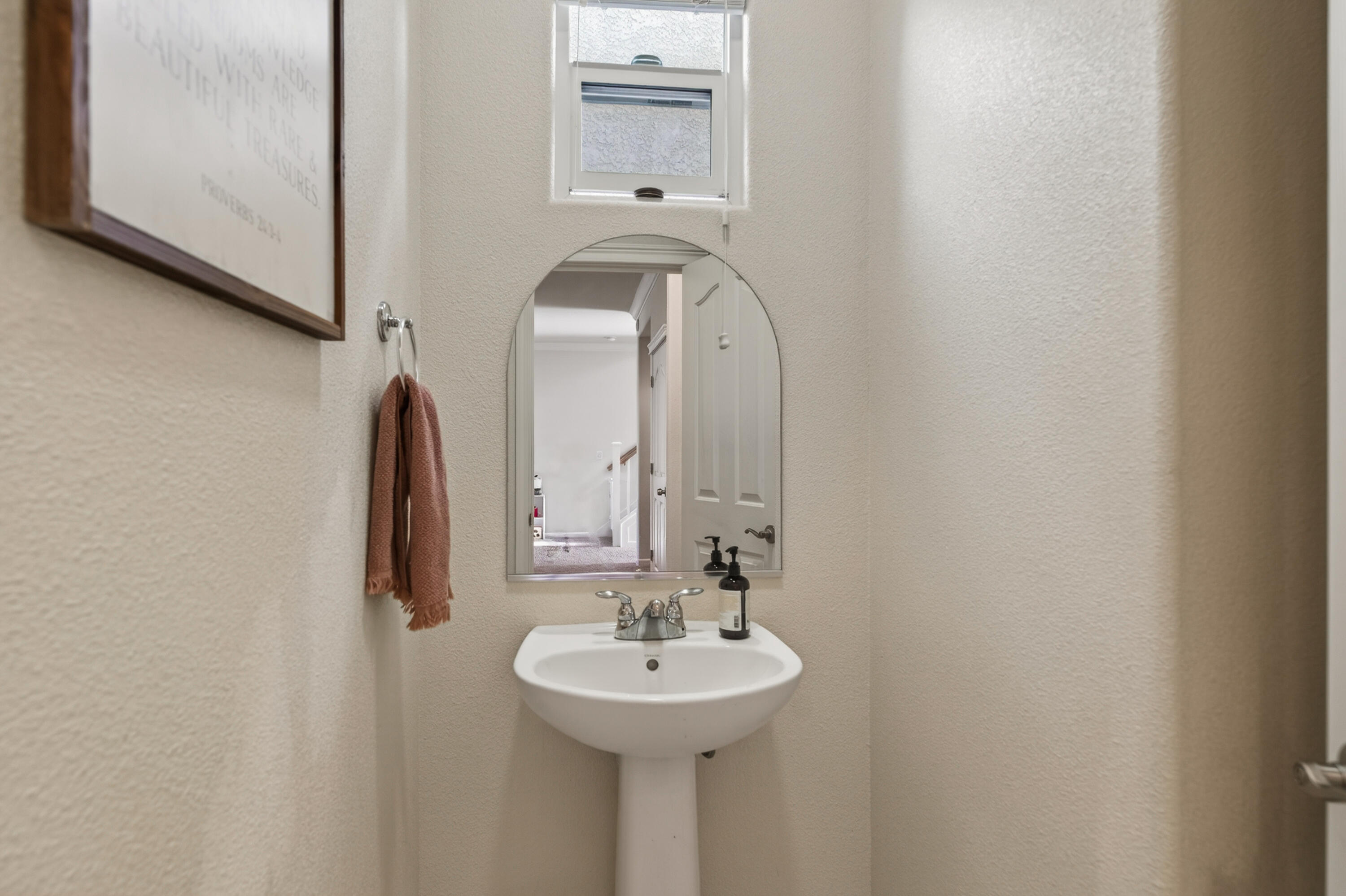 2090 Tuscany Way Redding, CA 96003 - Photo 10 of 37 a bathroom with a sink and a mirror