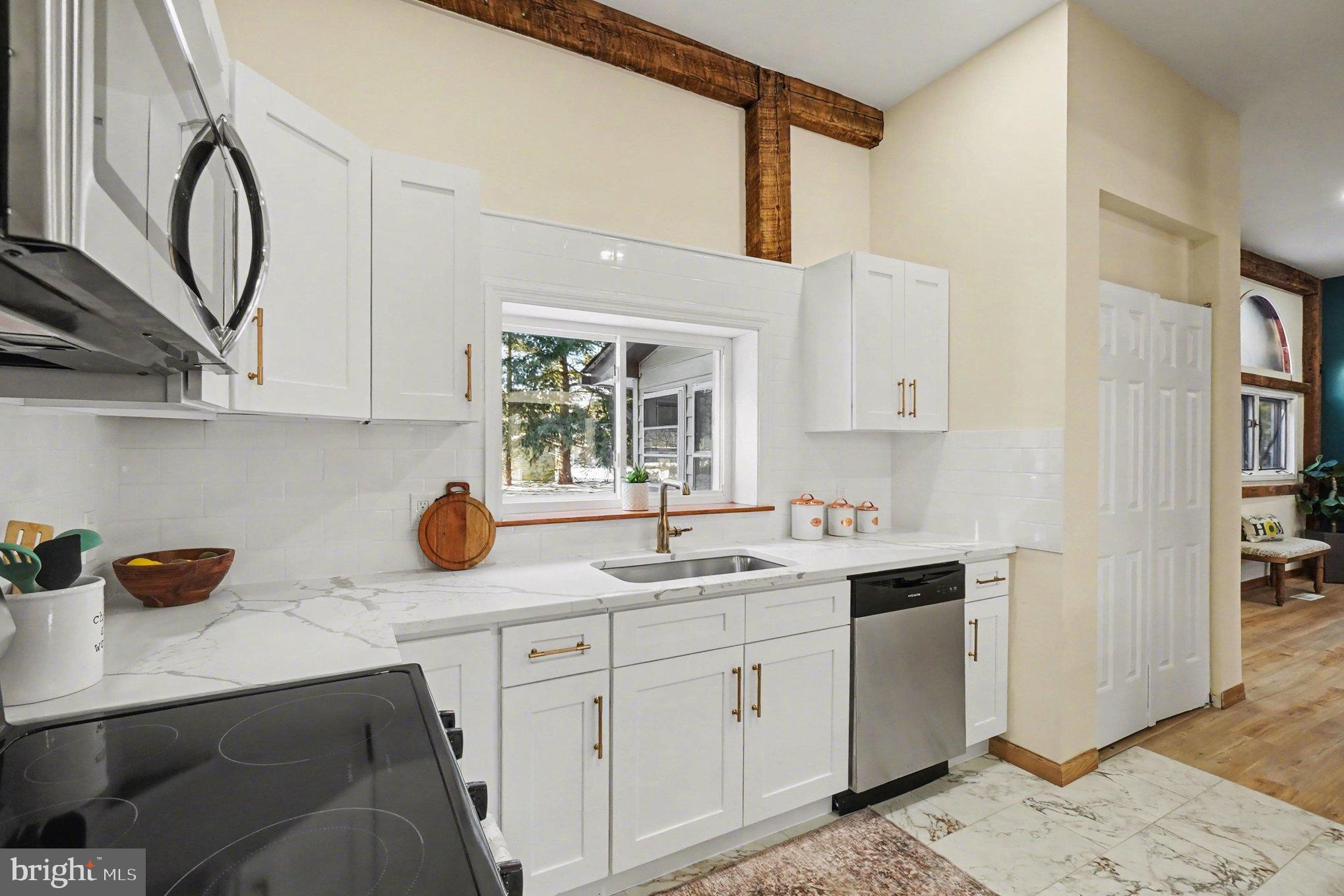 151 Fawn Drive Elkton, MD 21921 - Photo 14 of 26 a kitchen with a sink dishwasher and cabinets